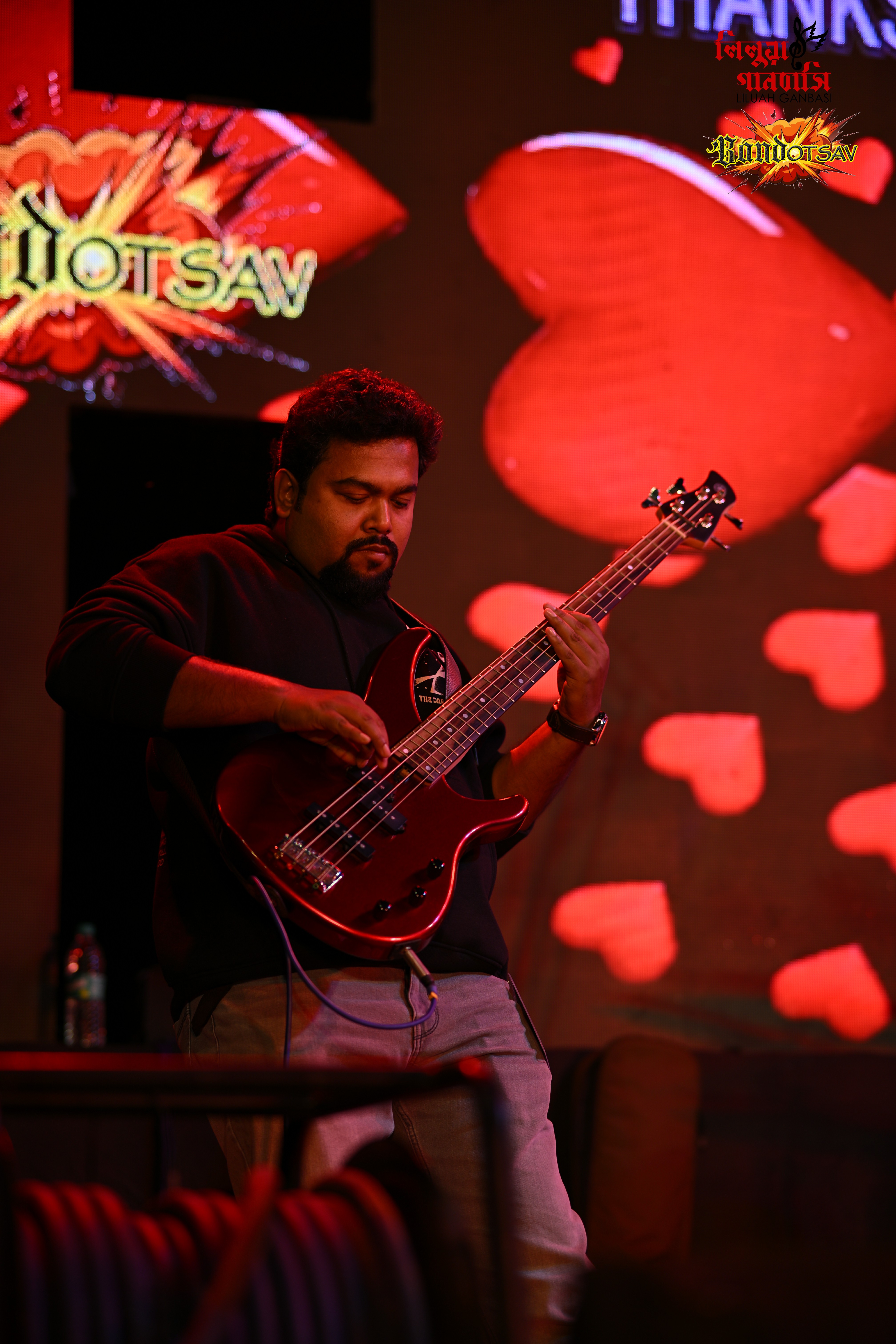 Between Blanks bassist performing on stage
